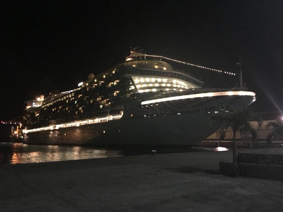 P&O Cruises Azura at night illuminated in the port of Barbados.